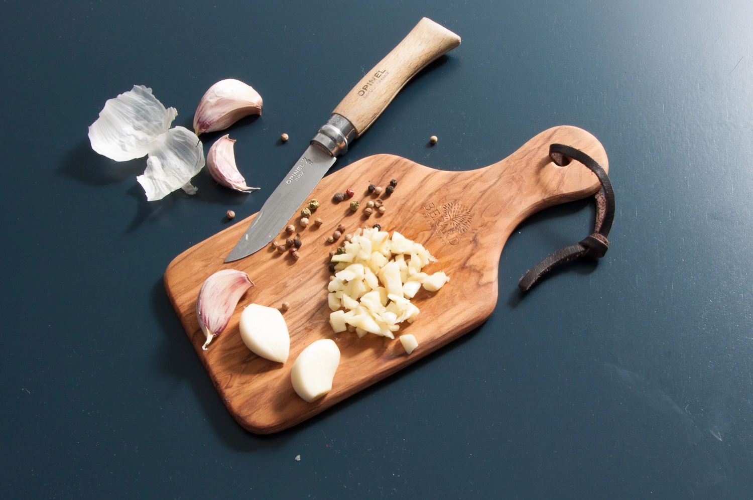 Planche à découper avec poignée